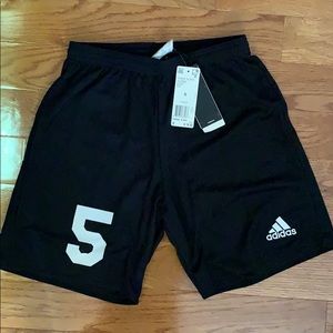 Adidas shorts with the #5